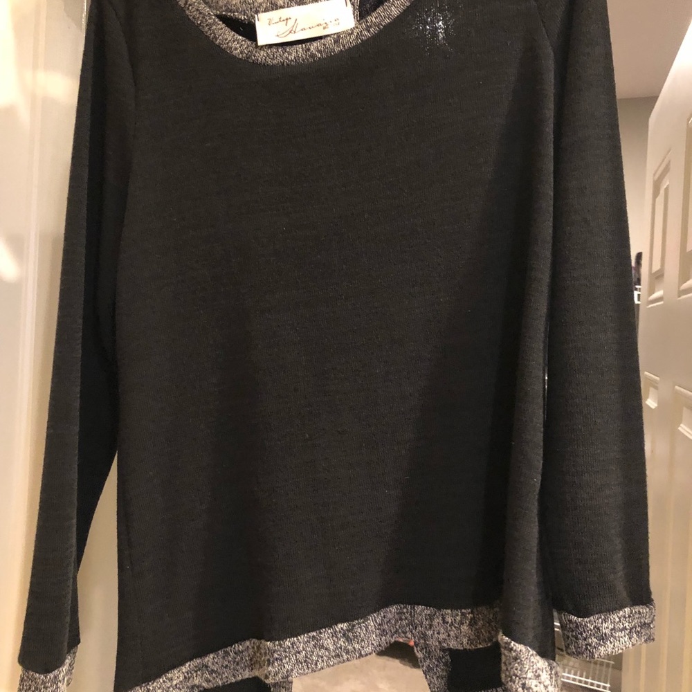 Black long sleeved shirt.